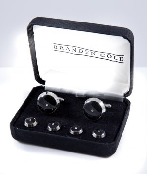 Round black cufflink and stud set with CZ chip